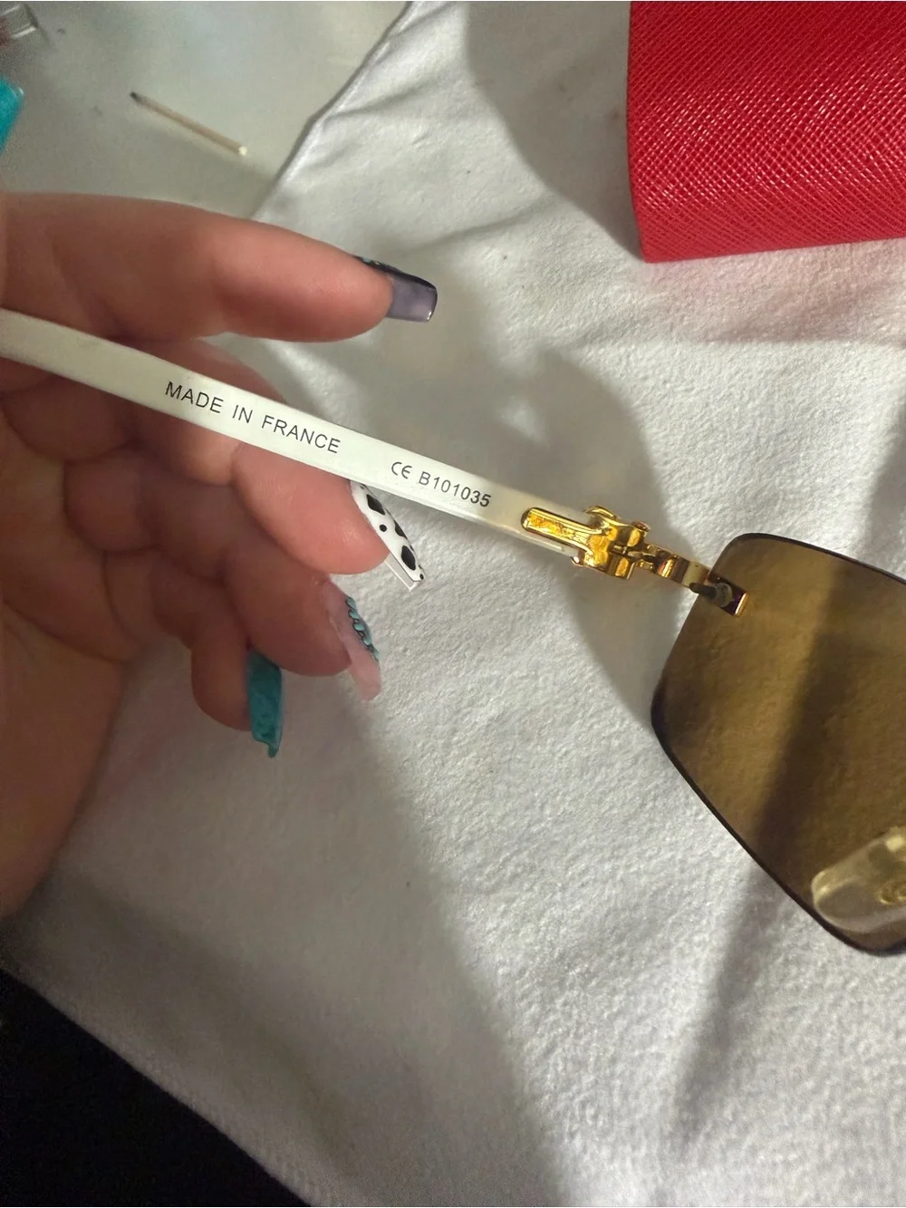 Cartier Rimless Sunglasses with Gold Frame and Brown Lenses